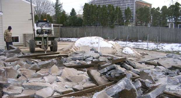 tearing out a concrete patio